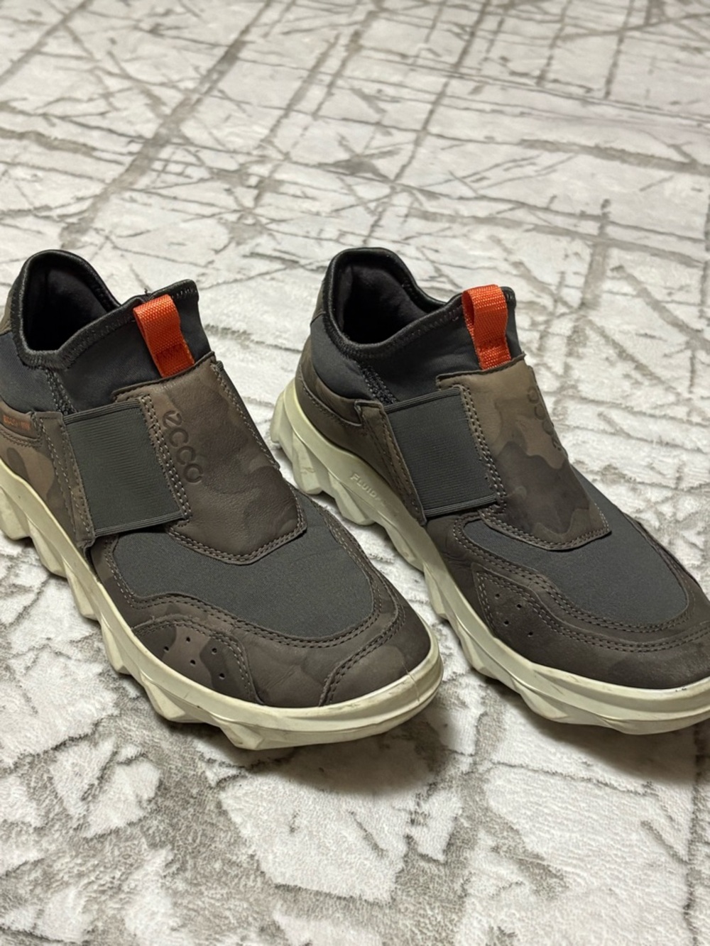 ECCO women’s Slip-On Sneakers in Olive Brown camo with Orange Pull Tab. Size 38